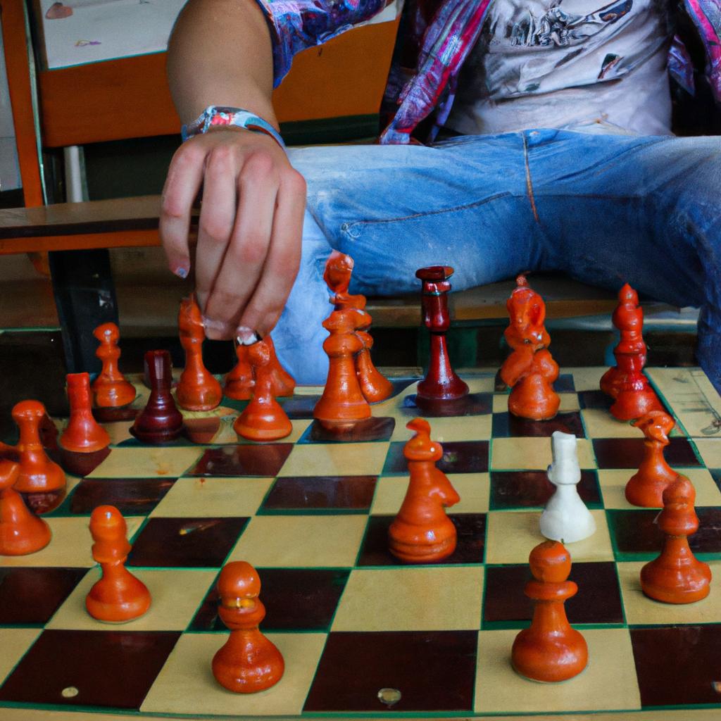 Person playing chess, studying moves